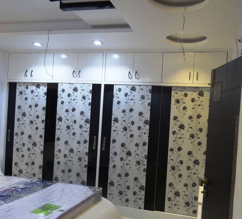 Residential House 3BHK -1600 SQFT, AMIGOS INTERIORS AMIGOS INTERIORS Classic style bedroom Wardrobes & closets