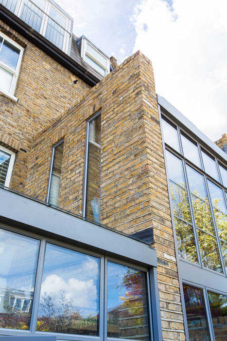 Double height crittall style extension HollandGreen Eclectic style houses