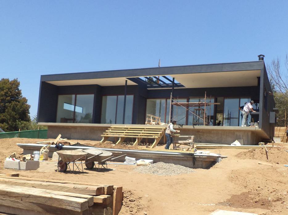 CASA SANFUENTE homify Casas unifamiliares Compuestos de madera y plástico casa veraneo