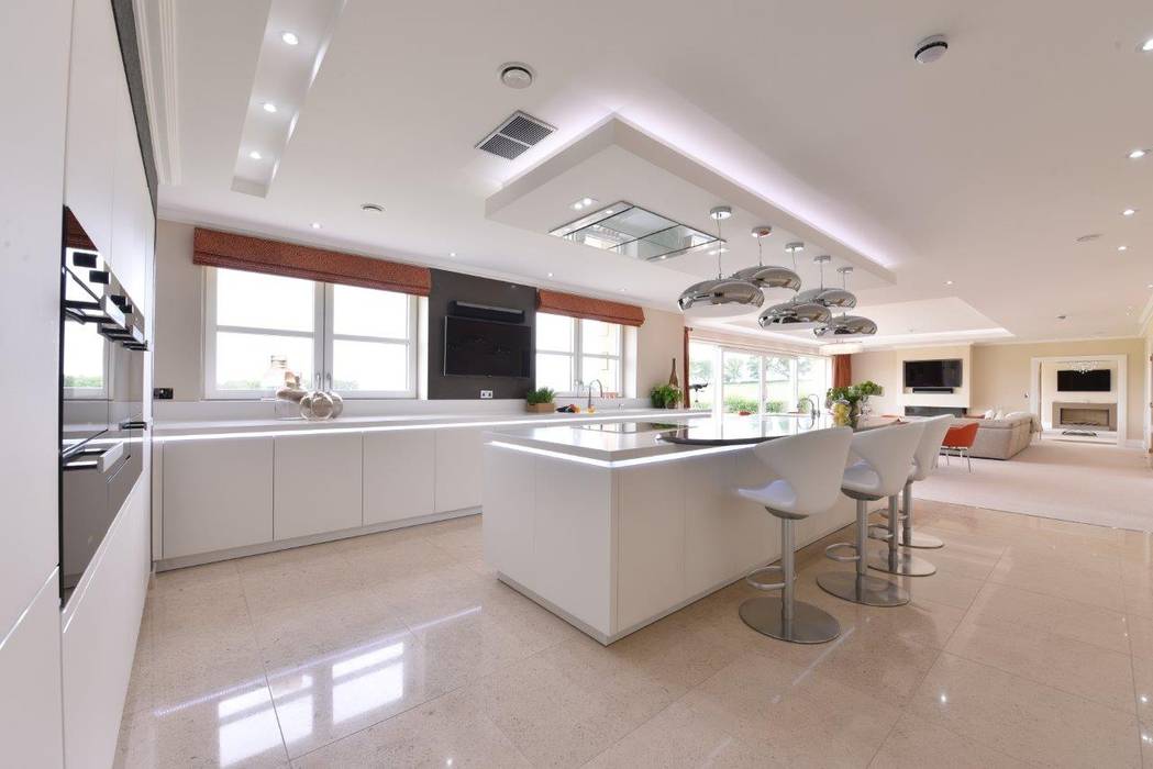 Mr and Mrs Stevenson Diane Berry Kitchens Built-in kitchens miele,corian,quooker,stools,white,cooking island,extractor,huge