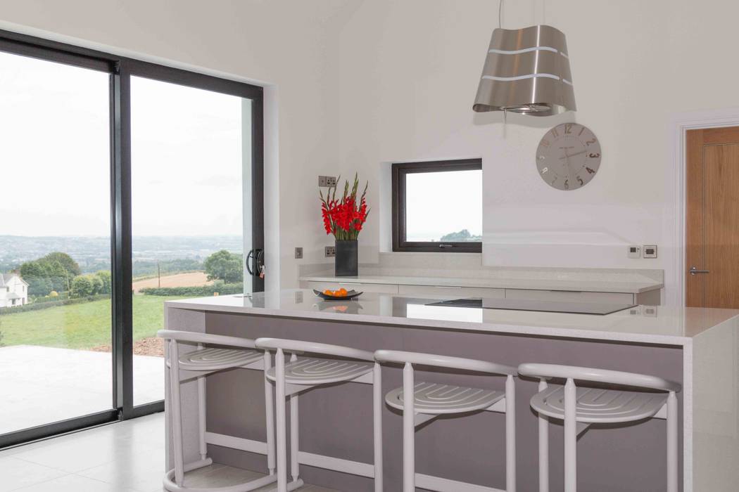 Countryside Views are appreciated from the large seating area on the island homify Cuisine intégrée Bois Effet bois breakfast bar,seating,island,modern kitchen,matte kitchen,matt kitchen,basalt,quartz worktops