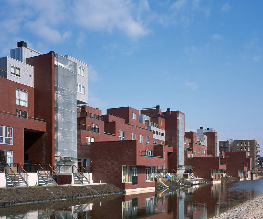 IJburg appartementen, Archipelontwerpers Archipelontwerpers Meergezinswoning Lucht,Wolk,Venster,Gebouw,Water,Stedelijk ontwerp,Condominium,woongebied,Torenblok,huis