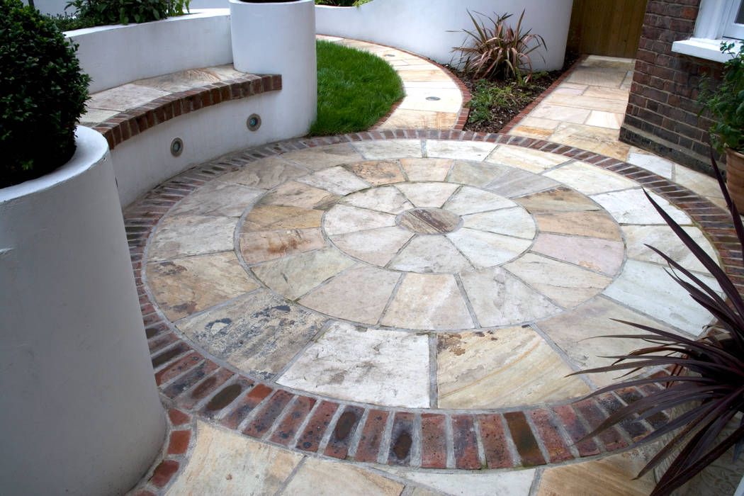 Sandstone circle Earth Designs Mediterranean style garden sandstone,patio,pavedcircle,bricks,outdoorlighting,mintfossil,gardenpath,lawn,turf,bench,gardenseat