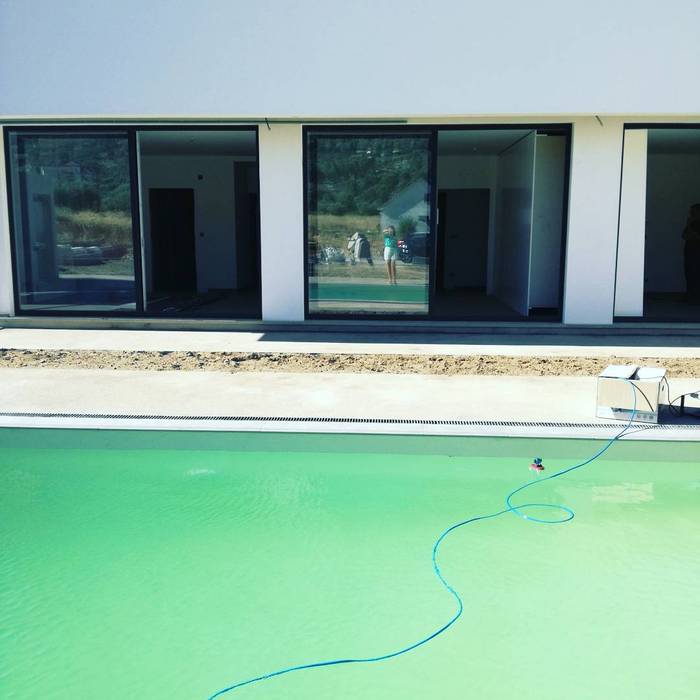 Casa JF Sandra Ferreira, Arquitetura Janelas de PVC Metal casa moderna,piscina ao ar livre