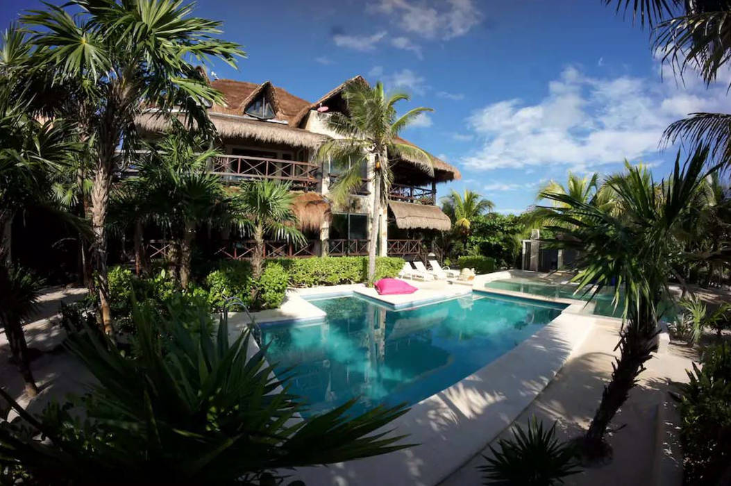 Sombras del viento, DHI Riviera Maya Architects & Contractors DHI Riviera Maya Architects & Contractors Villas