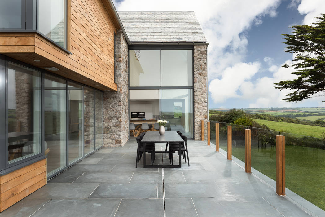 Contemporary Replacement Dwelling, Cubert, Laurence Associates Laurence Associates Detached home Glass terrace,dining table,dining chair,outdoor dining,patio,outdoor furniture,balustrade,glass balustrade,full height glazing,indoor outdoor