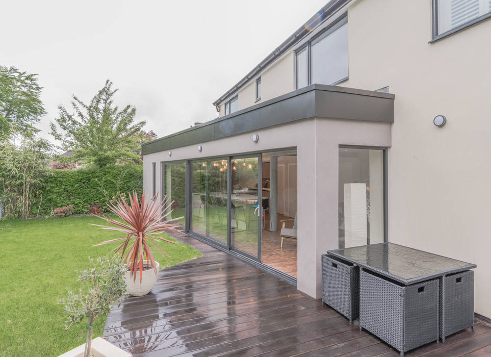 Angled extension. Much narrower at this end. John Gauld Photography Detached home Extension,Grey windows,Patio