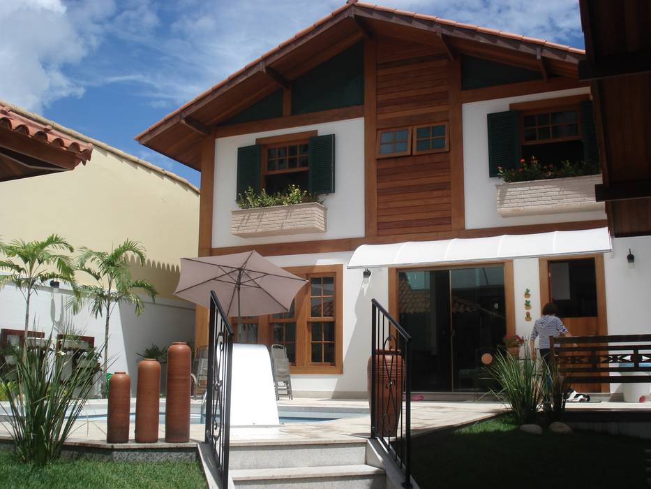 ​Em Campos, uma casa de campo, Ronaldo Linhares Arquitetura e Arte Ronaldo Linhares Arquitetura e Arte Chalés e casas de madeira