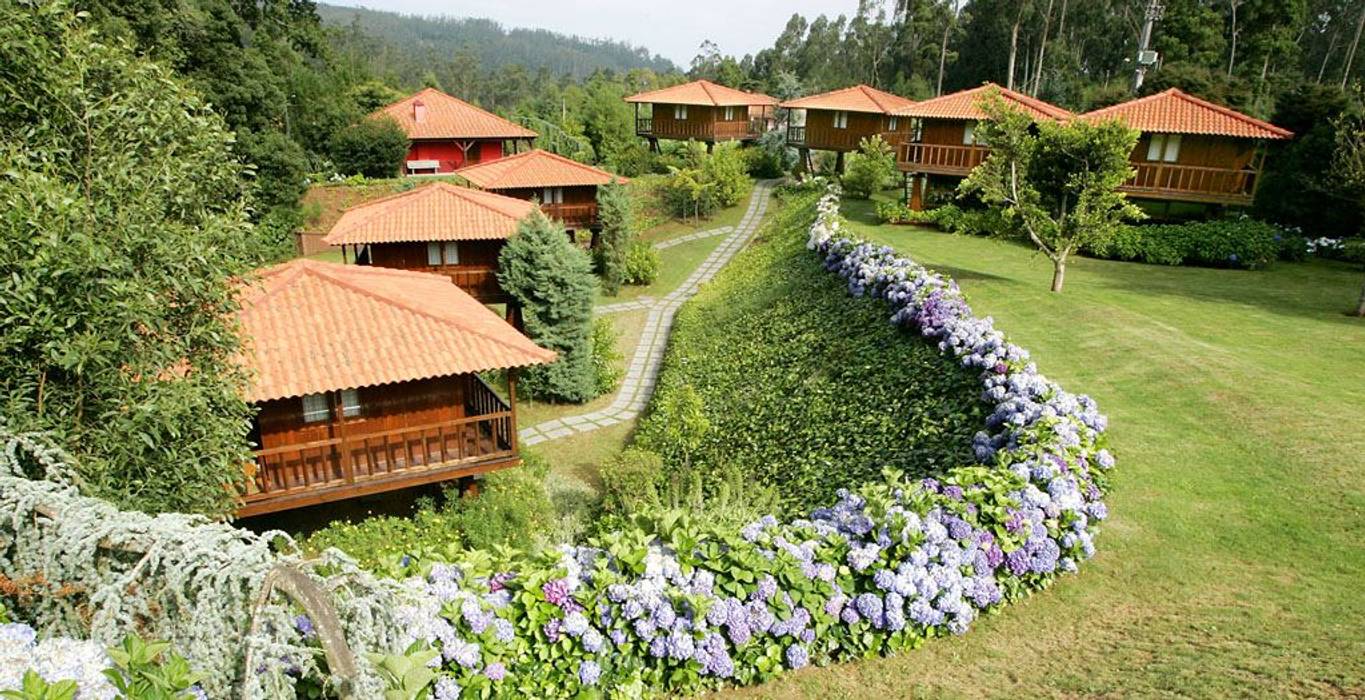 RUSTICASA | Quinta das Eiras | Madeira, RUSTICASA RUSTICASA Casas de madeira Madeira Acabamento em madeira casa,Casa Pré-fabricada,casa de madeira,madeira,exterior de madeira,parede de painéis de madeira,Rusticasa