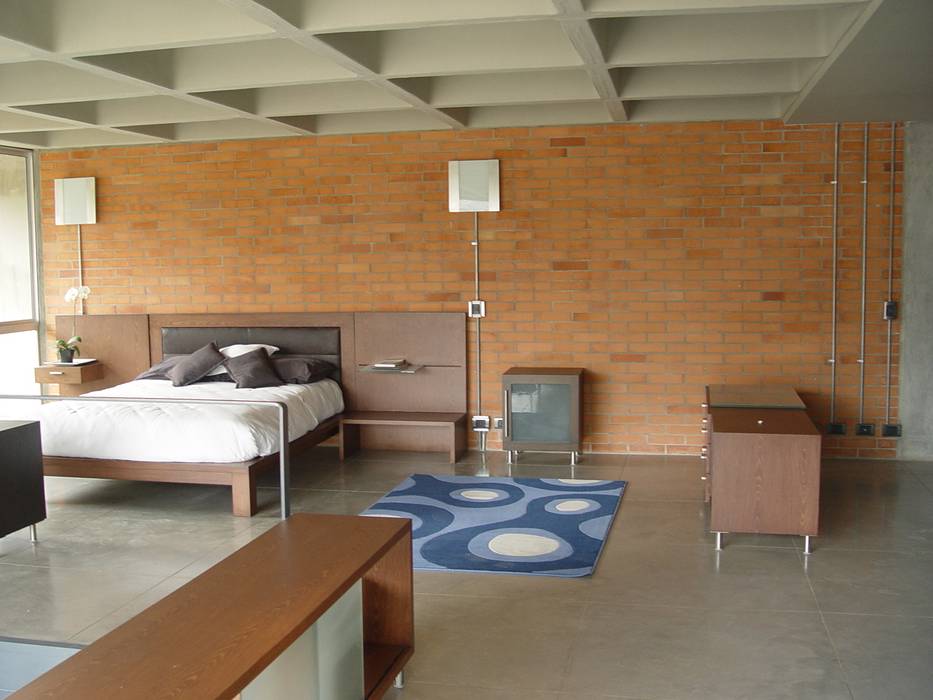 Astorga Loft ARQUITECTOS URBANISTAS A+U Dormitorios modernos