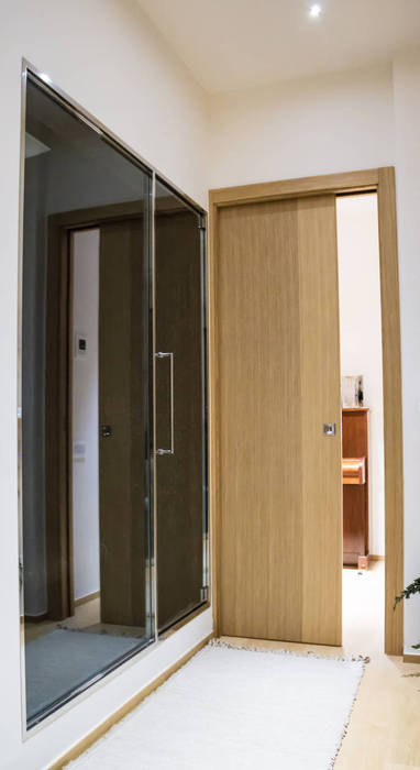 Scrigno for the Parchitello Alta complex harmonious shapes and lines for an eco-sustainable and people-friendly result Scrigno S.p.A. Unipersonale Sliding doors sliding door,doors