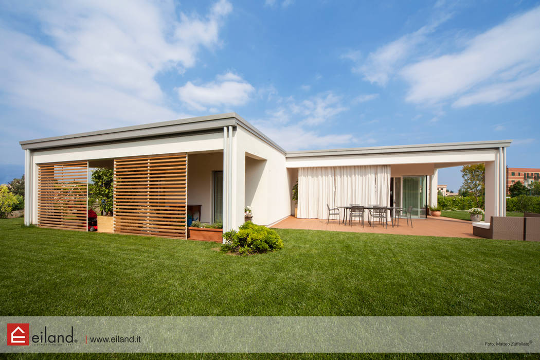 Il giardino EILAND Case in stile minimalista Legno Effetto legno giardino,frangisole,casa di legno,piano unico