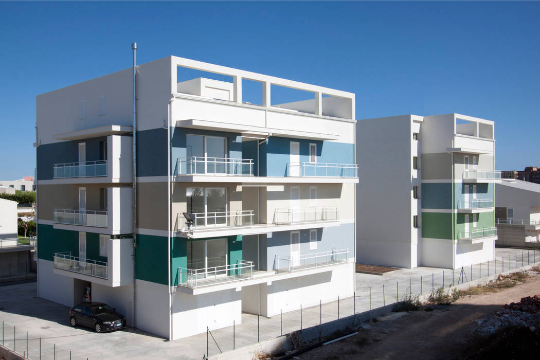 Complesso residenziale MINERVA - 23 alloggi sociali di edilizia convenzionata, studio di architettura Antonio Giummarra studio di architettura Antonio Giummarra Condominio