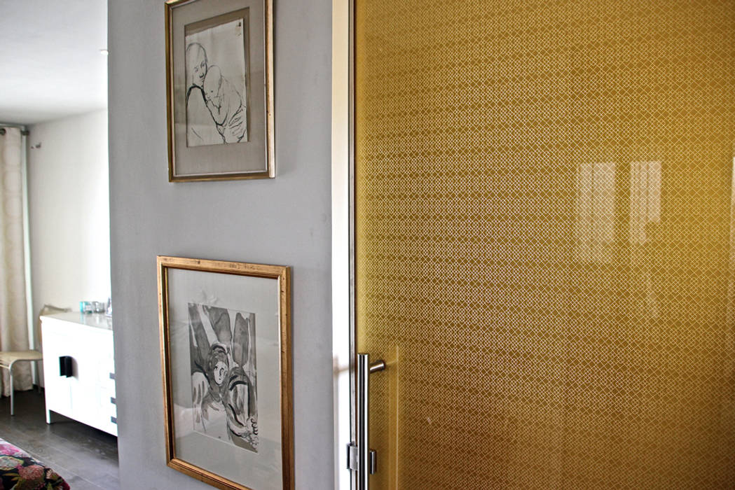 Golden glass door with bespoke pattern, Alguacil & Perkoff Ltd. Alguacil & Perkoff Ltd. Puertas de vidrio Vidrio