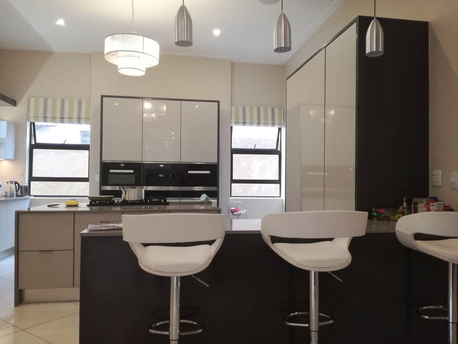 High Gloss Grey Doors With Grey Counter Tops And Charcoal