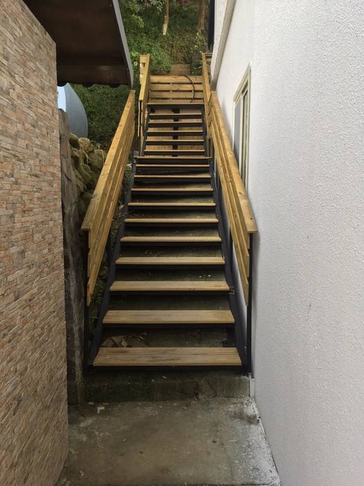 homify Rustic style corridor, hallway & stairs Wood Wood effect