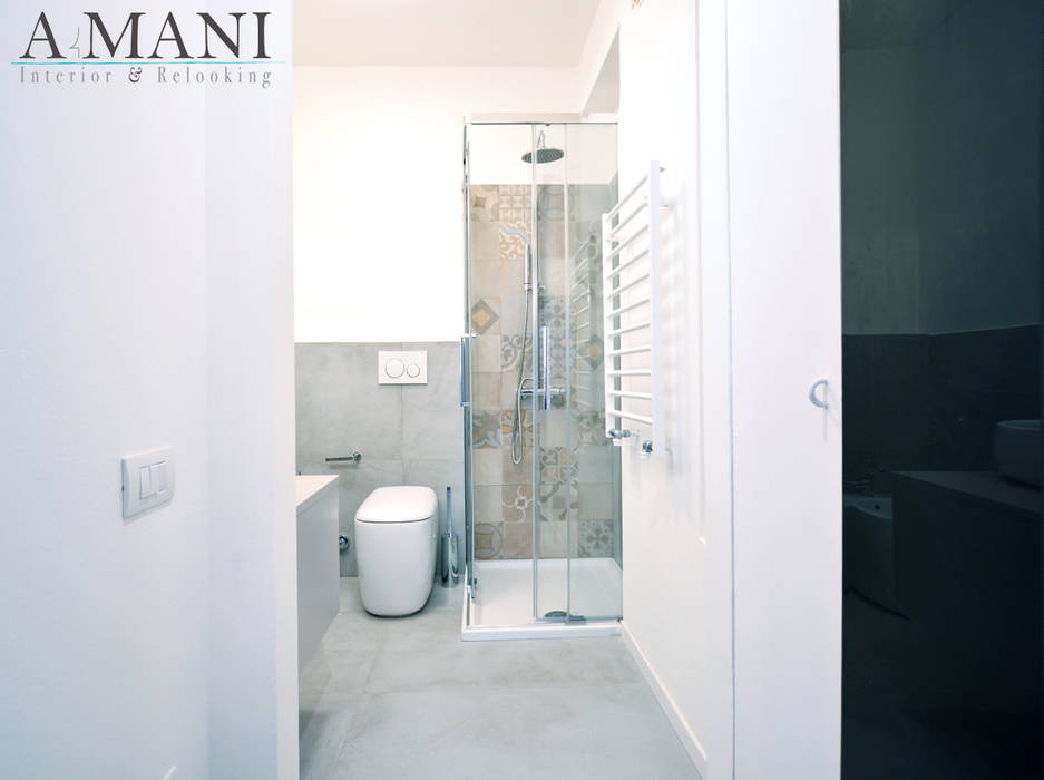 Studio Flat Lupetta, A4MANI - Interior & Architecture A4MANI - Interior & Architecture Modern bathroom Ceramic