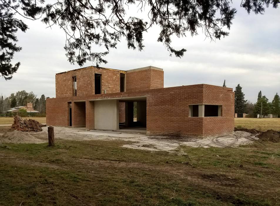 Diseño de Casa en Serralta por 1.61 Arquitectos, 1.61arquitectos 1.61arquitectos Single family home Bricks