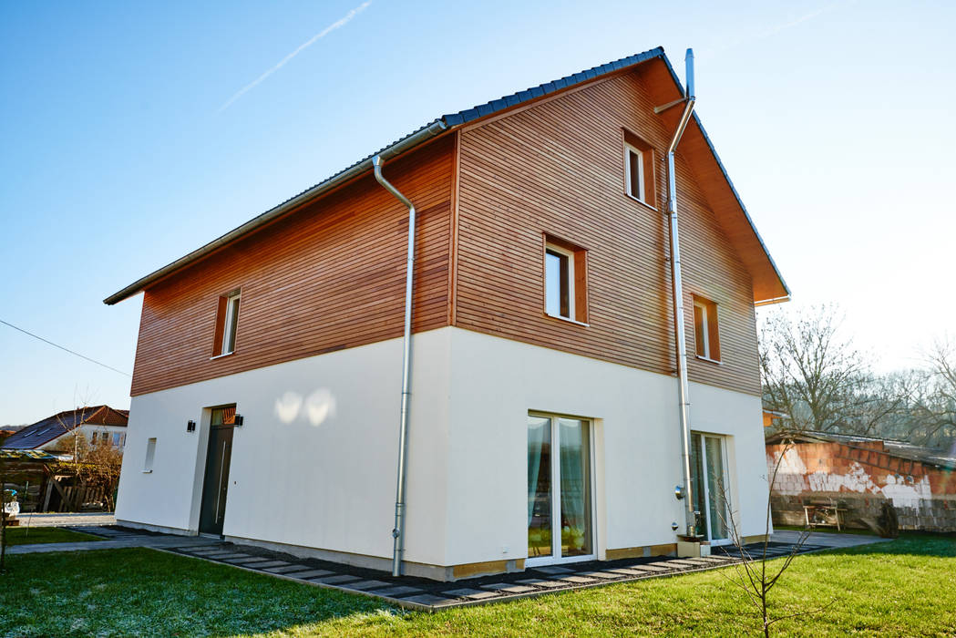 Haus am See, PassivHausPartschefeld PassivHausPartschefeld Casas ecológicas Madera maciza Multicolor