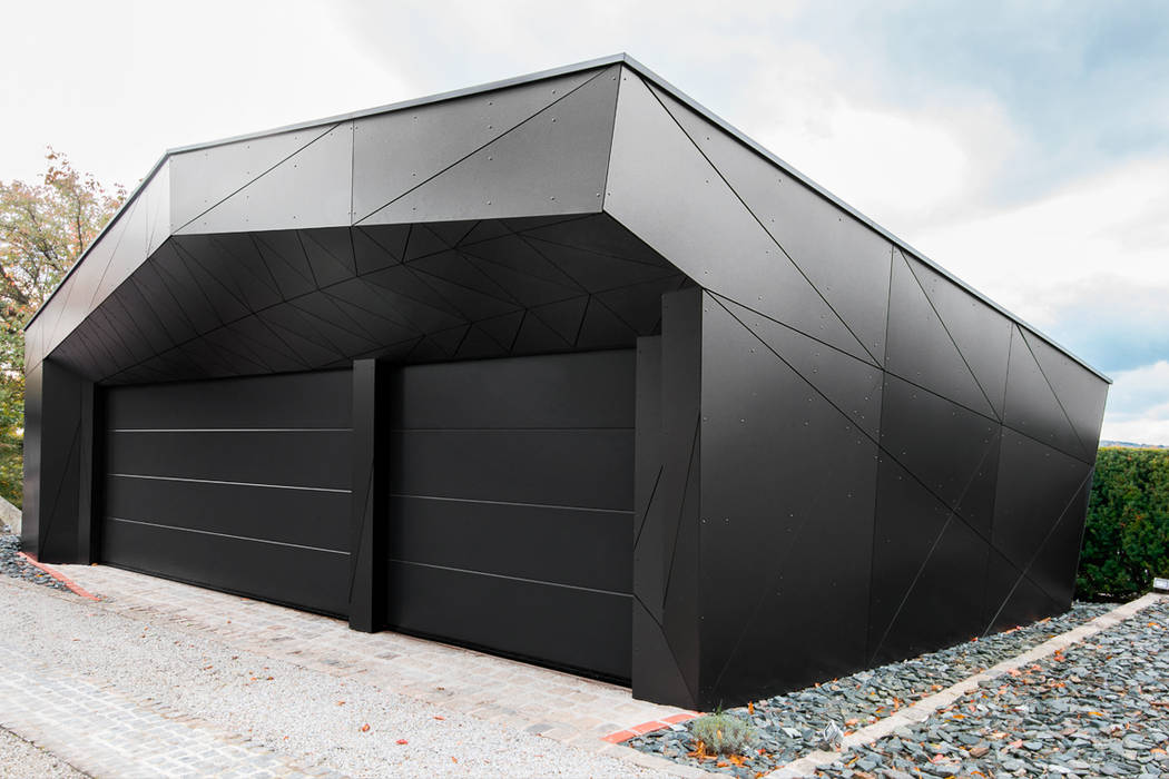 Monolith in Schwarz, plusEnergieArchitektur plusEnergieArchitektur Eclectische garage