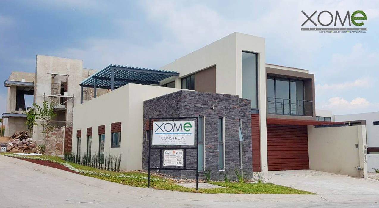 M-13, Xome Arquitectos Xome Arquitectos モダンな 家 石