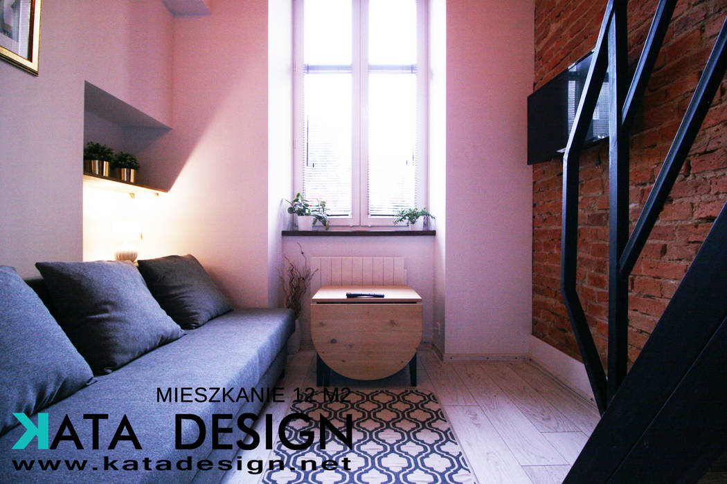 Mieszkanie w centrum Krakowa 12 m2, Studio4Design Studio4Design Вітальня Цегла