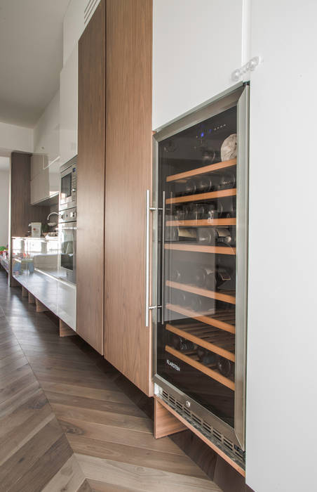 Attico Milano centro, DELFINETTIDESIGN DELFINETTIDESIGN Built-in kitchens Wood Wood effect