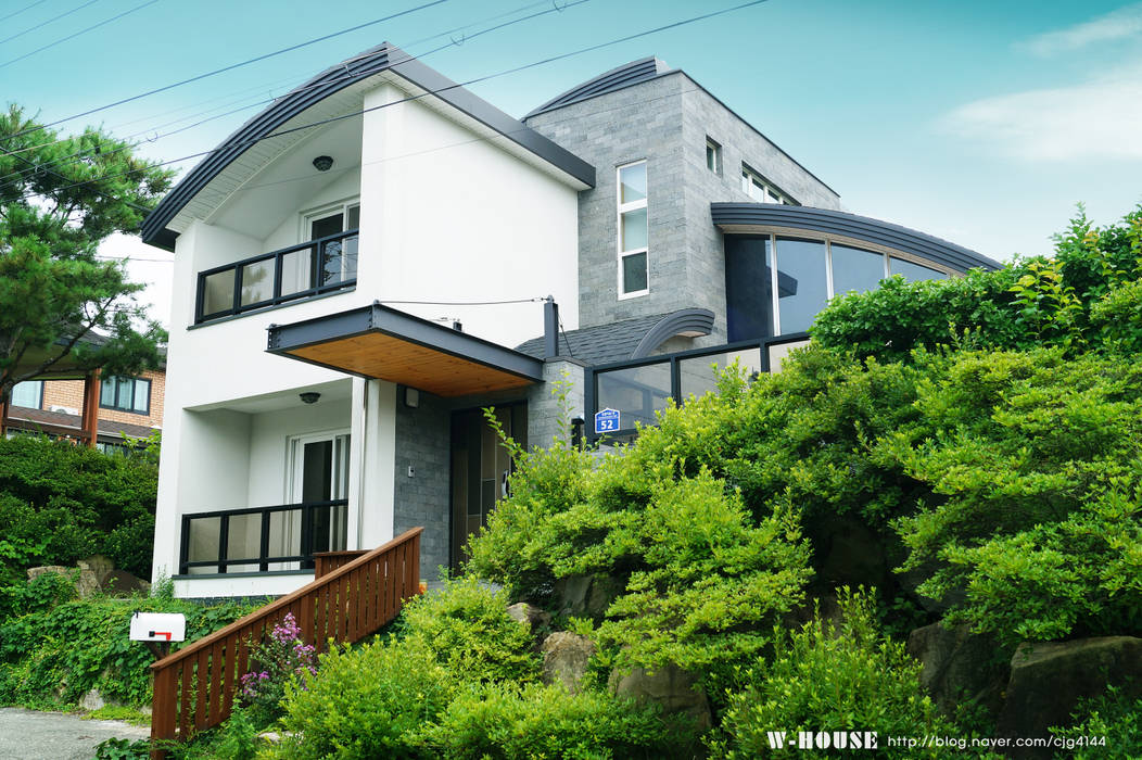 세종시 청벽마을 45평형 ALC친환경 리모델링, W-HOUSE W-HOUSE Casas de campo Concreto