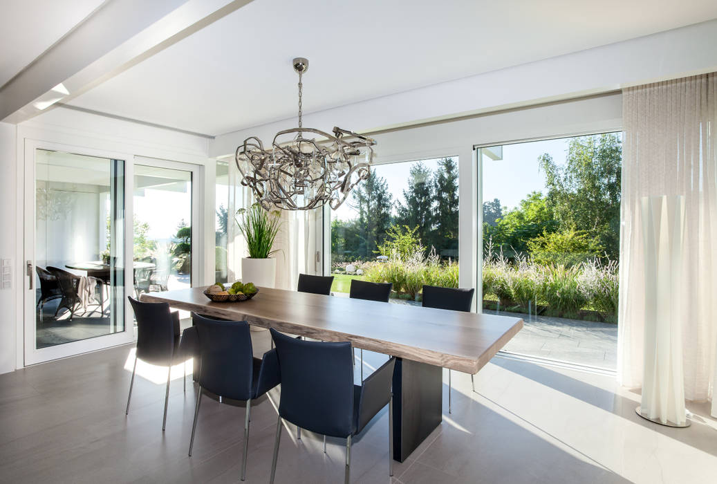 A dream home that is good for the soul DAVINCI HAUS GmbH & Co. KG Столовая комната в стиле модерн