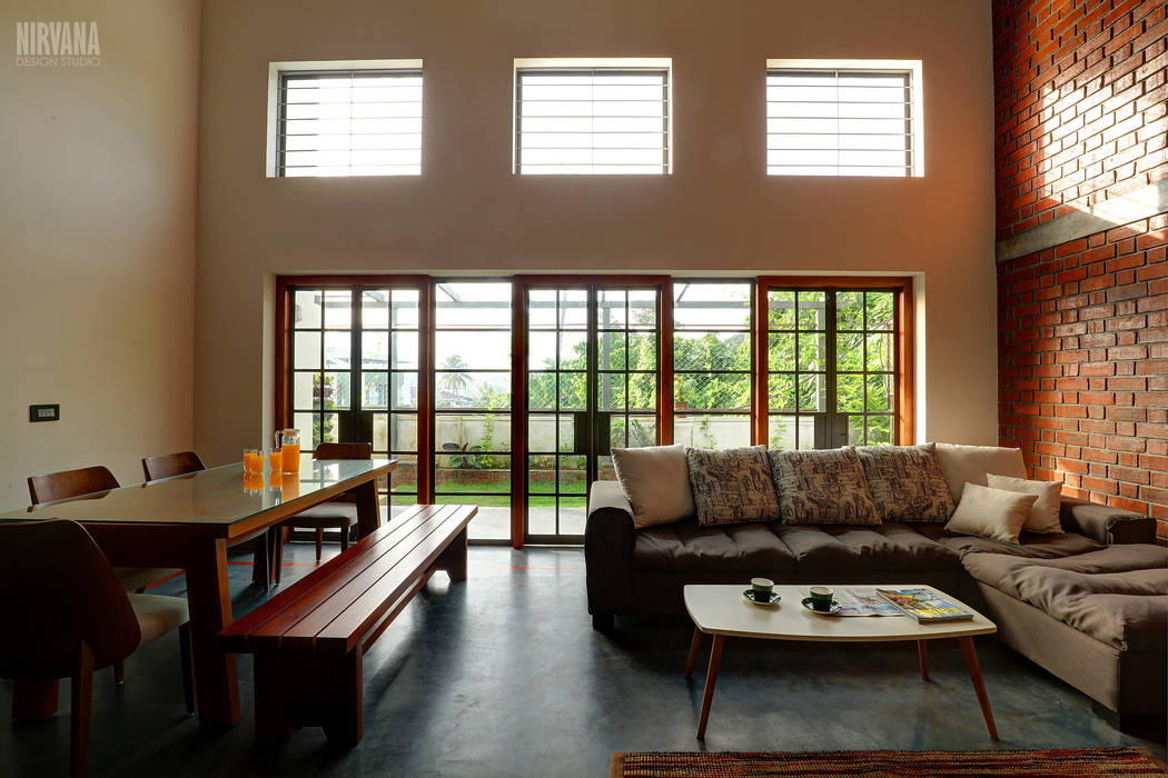 Tropical home 1, Studio Nirvana Studio Nirvana Tropical style living room oxide flooring,french door,patio