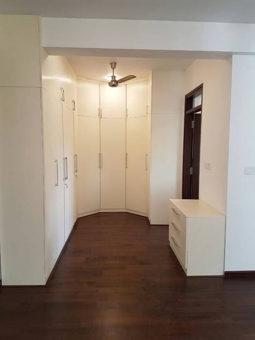 Hinged door wardrobe with loft in high gloss white laminate on mdf