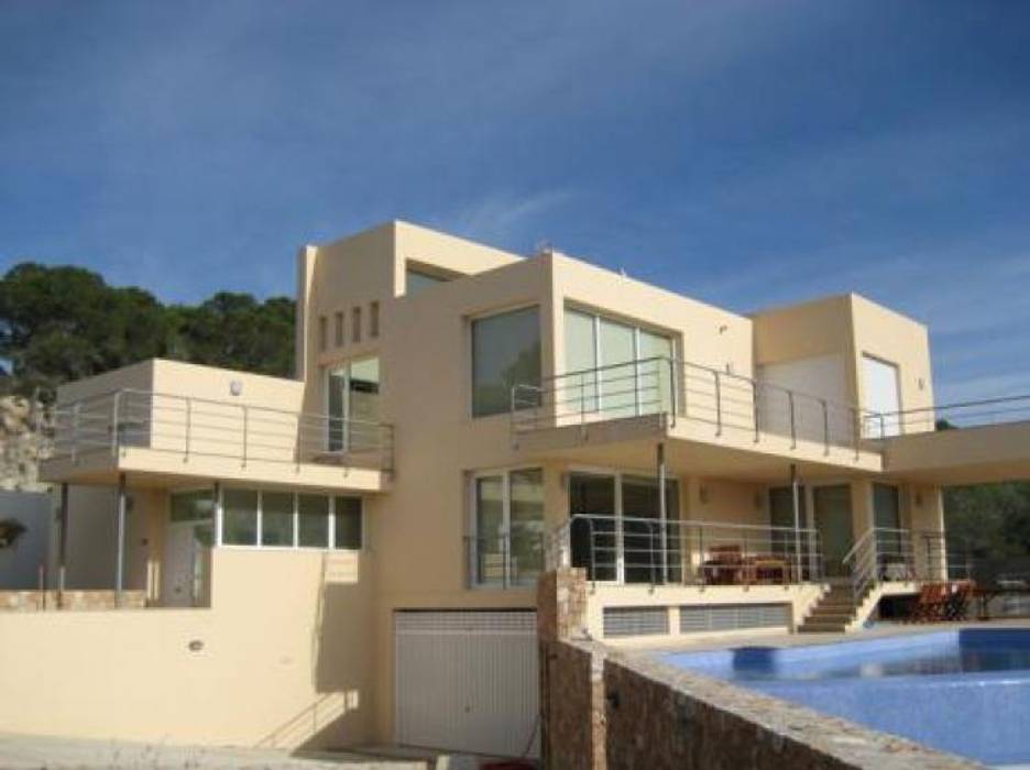 Modern villa with frontal sea view in Ibiza, FHS Casas Prefabricadas FHS Casas Prefabricadas Parcelas de agrado Concreto