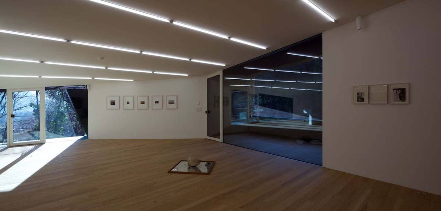 La casa del Collezionista, Studio Marastoni Studio Marastoni Finestre & Porte in stile minimalista