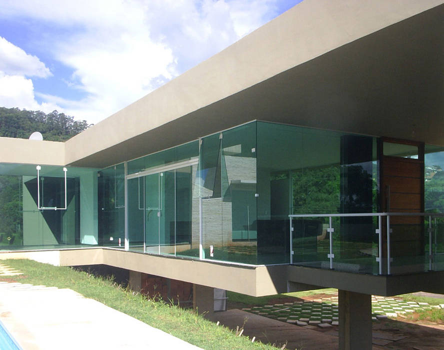 Vista dos caixilhos das salas ODVO Arquitetura e Urbanismo Portas e janelas modernas arquitetura,conceito aberto,conceito integrado