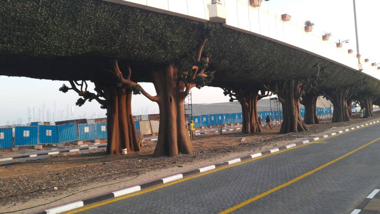 #SUNWING artificial foliage hedges in a forest bridges project in the #Dubai, Sunwing Industrial Co., Ltd. Sunwing Industrial Co., Ltd. Espacios comerciales Plástico Estadios