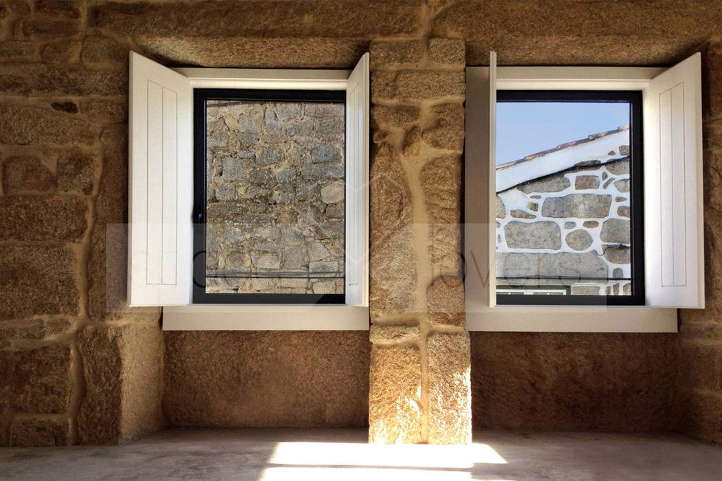 Reabilitação de Casa nas Freixedas, Pinhel Salas de estar modernas por spacelovers Moderno