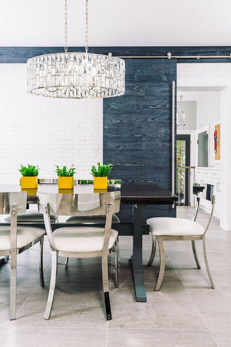 Eclectic dining Frahm Interiors Modern dining room Chrome,yellow,brick,tile,chandelier,barn door