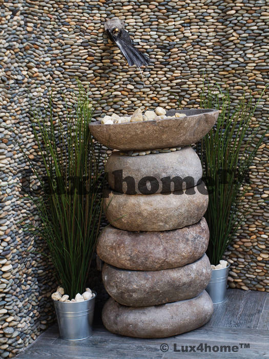 Pebble stone vessel sinks - Natural River Stone sink bathroom homify Steam Bath
