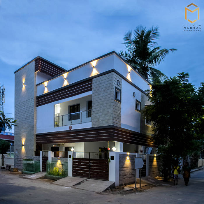 Night view Studio Madras Architects Single family home Sky,Plant,Window,Building,Tree,Arecales,Cloud,Residential area,Facade,Real estate