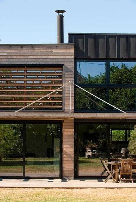 homify Casas de madera Derivados de madera Transparente