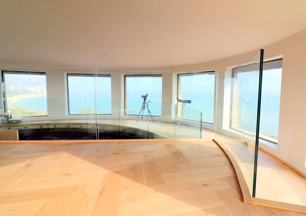 Curved glass balustrade in heritage tower home Ion Glass Tejados Vidrio glass