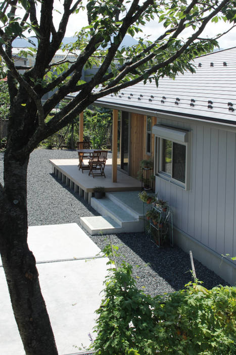 ＡＭ 中庭と縁側の平屋, 塚野建築設計事務所 塚野建築設計事務所 Casas de madera Madera Acabado en madera