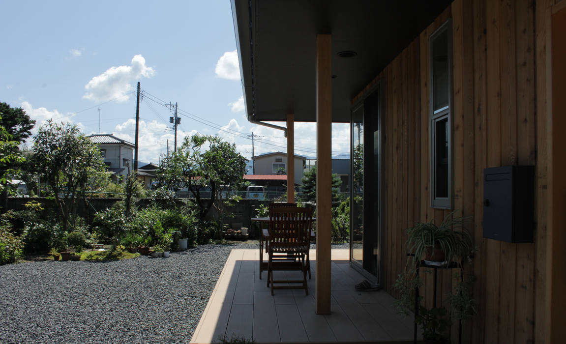 ＡＭ 中庭と縁側の平屋, 塚野建築設計事務所 塚野建築設計事務所 Ahşap ev Ahşap Ahşap rengi