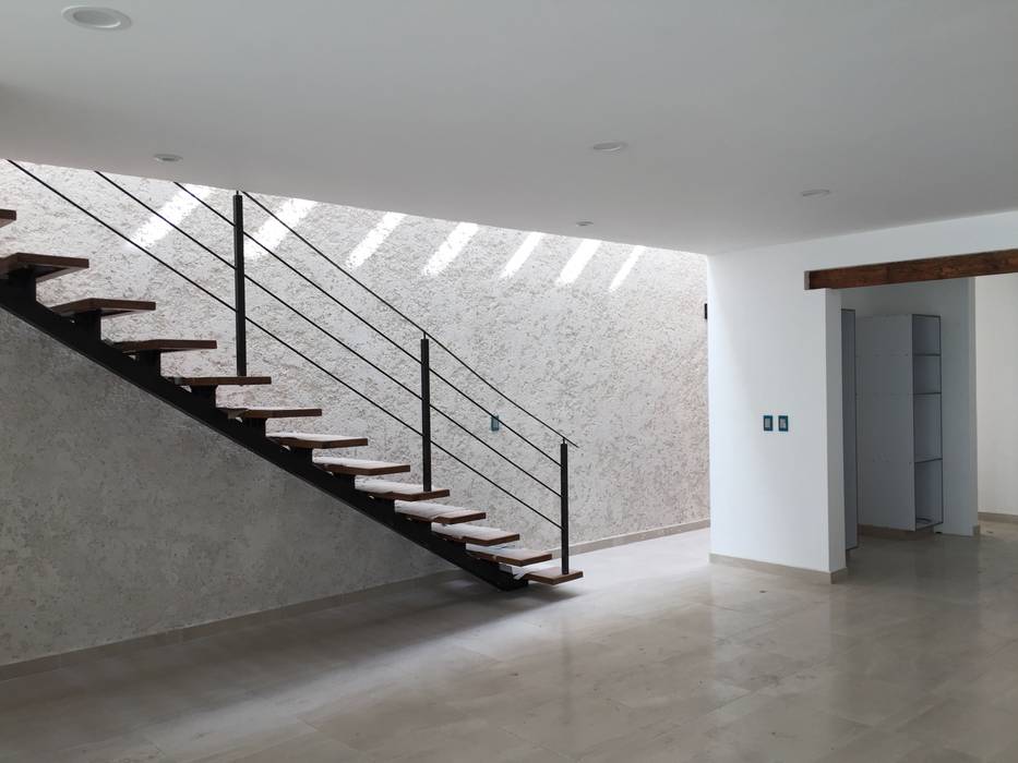 Escalera bajo domos Cahtal Arquitectos Escaleras Hierro/Acero