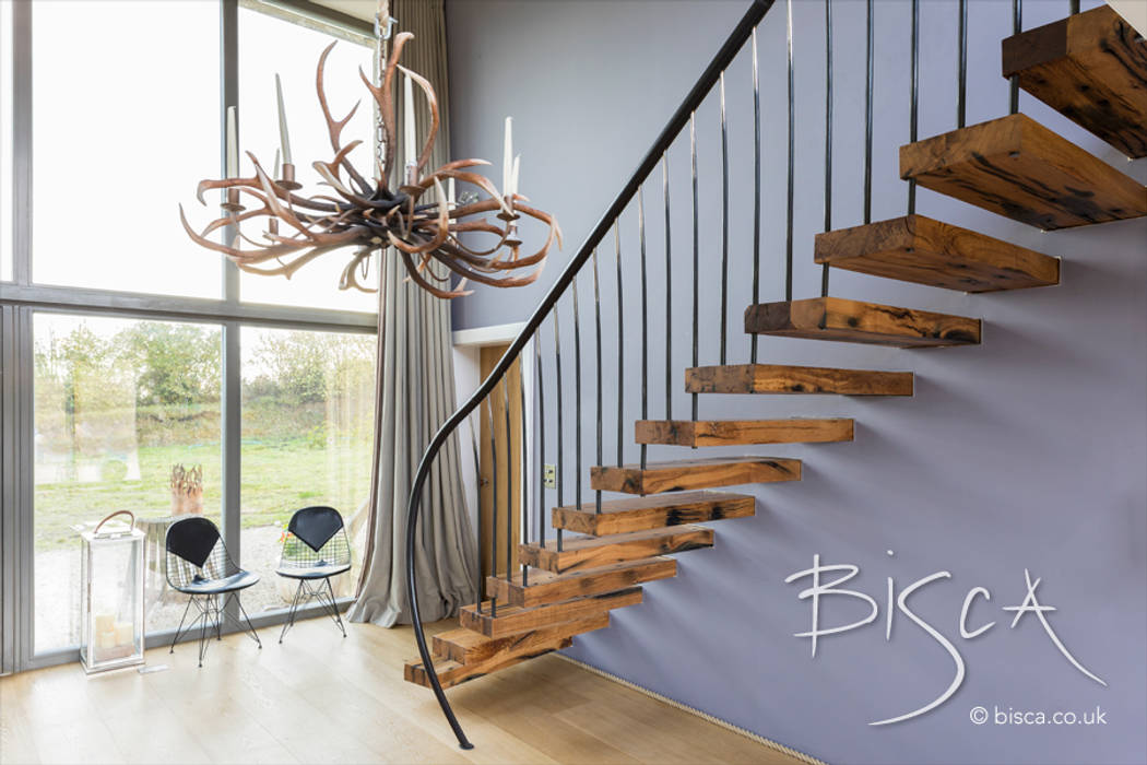 Flamed oka cantilevered staircase Bisca Staircases درج خشب Wood effect rustic,cantilevered,flamed oak,blacksmith,forged,bisca