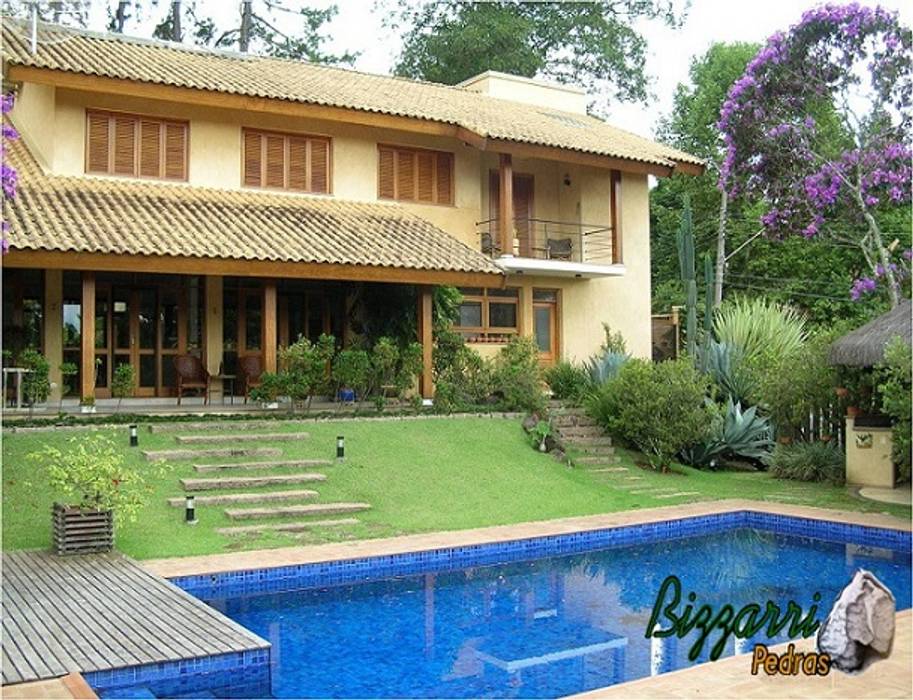 Construcao De Piscinas Com Passeio Em Piso De Tijolo Bizzarri Pedras Piscina Homify
