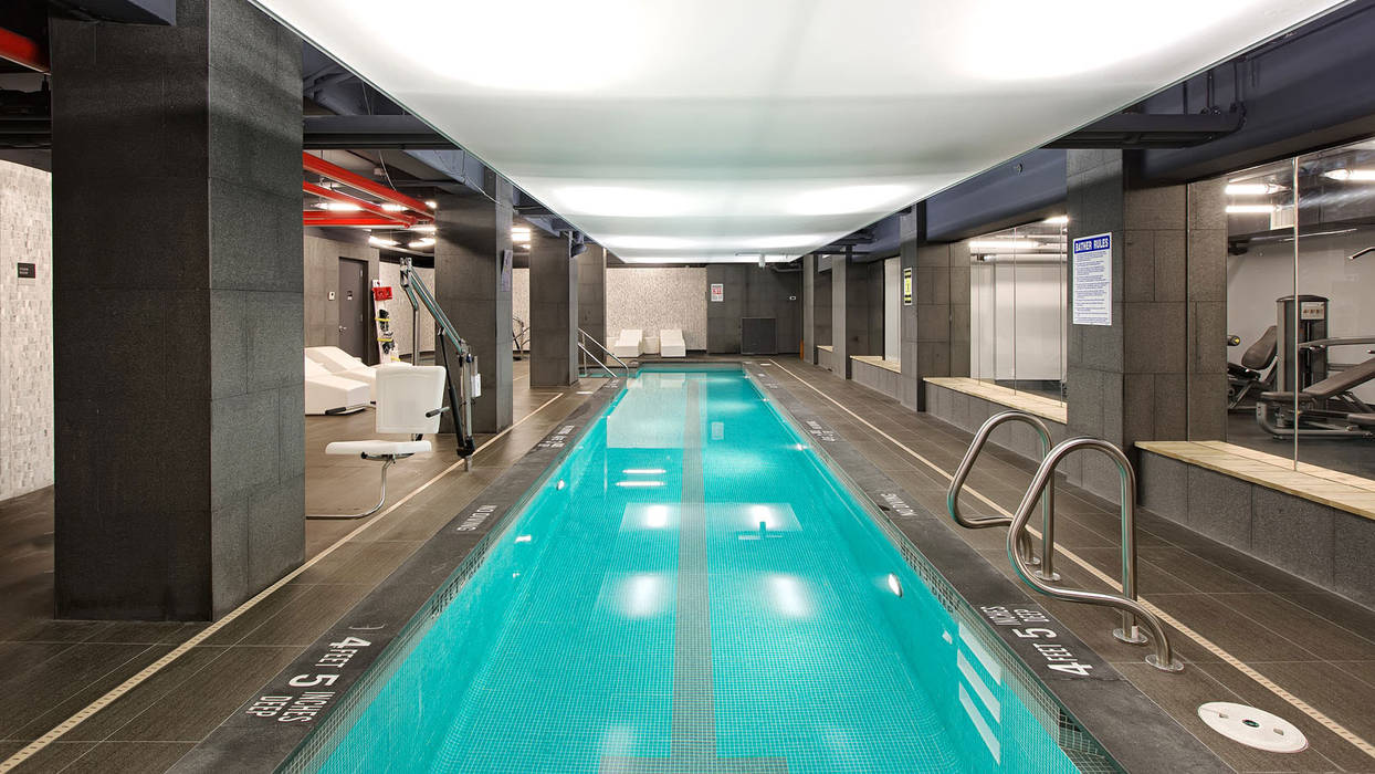 The Windermere | Swimming Pool GD Arredamenti Переливные бассейны GD Arredamenti,GeD cucine,GD cucine,contract,indoor pool,indoor sauna,grey sofa,home gym,wood flooring,white house,night lighting,LED Lighting