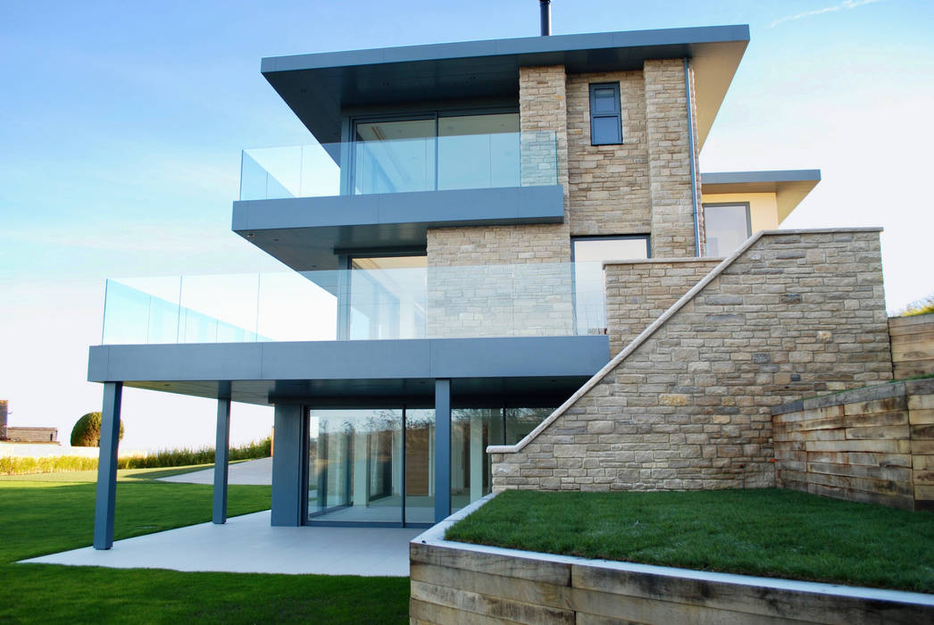 Family Home in Swanage, Dorset, David James Architects & Partners Ltd David James Architects & Partners Ltd منازل stone cladding