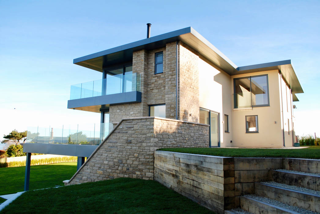 Family Home in Swanage, Dorset, David James Architects & Partners Ltd David James Architects & Partners Ltd Modern houses stone cladding