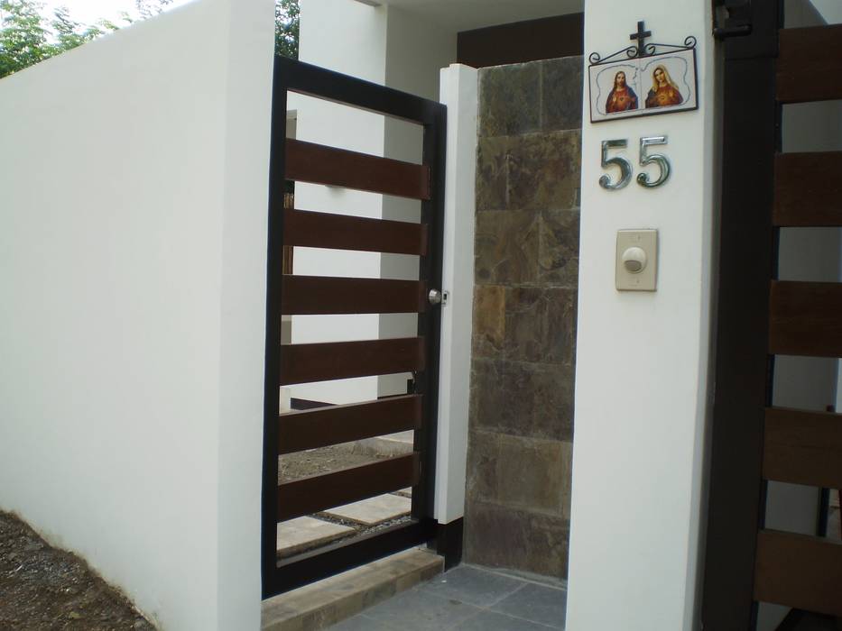 Gate of Reconstructed HC-Residence KDA Design + Architecture Front doors